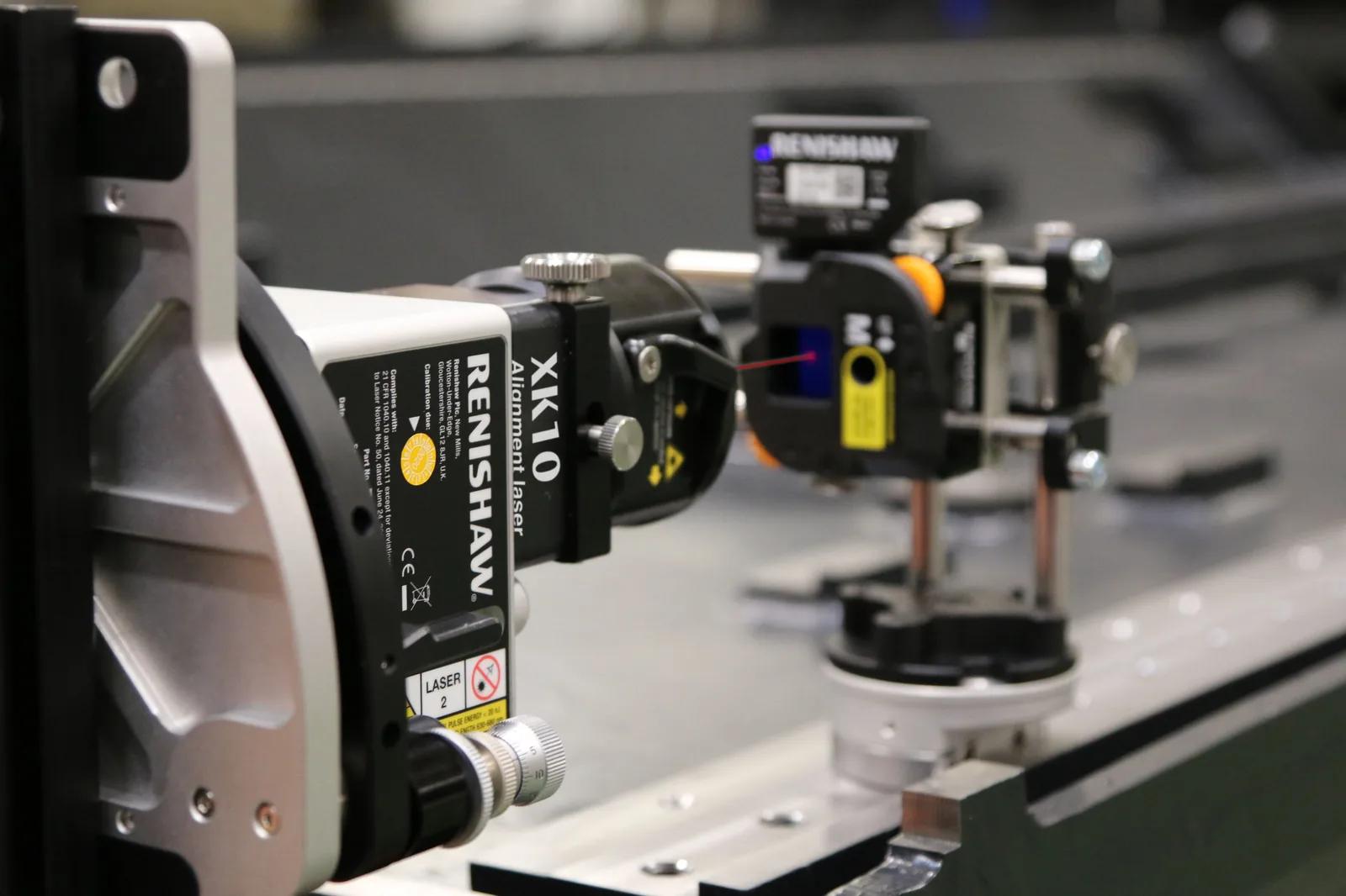 Renishaw XK10 laser calibrator set up on a machine bed