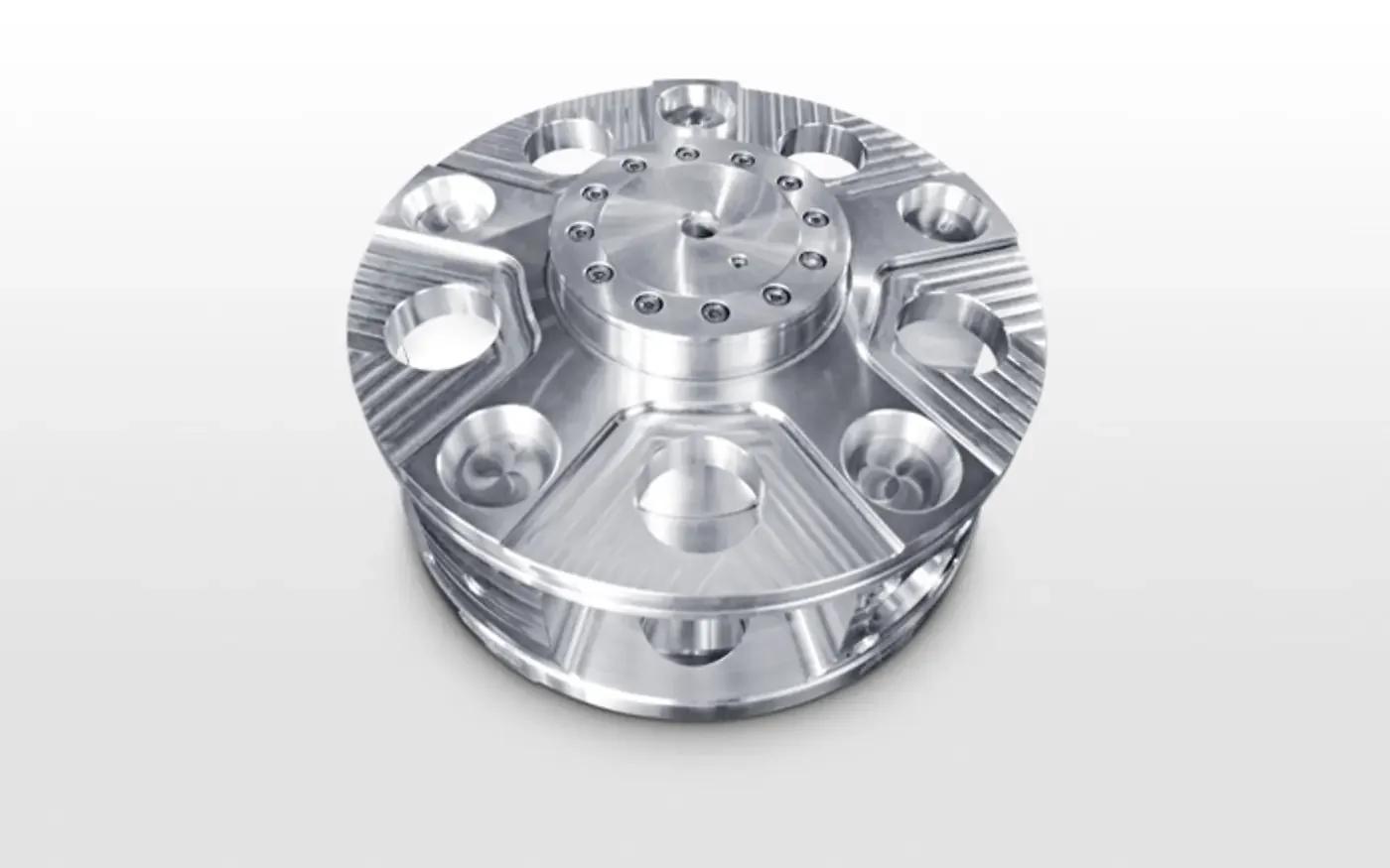 Machined planet carrier with a ring of bores on a flange